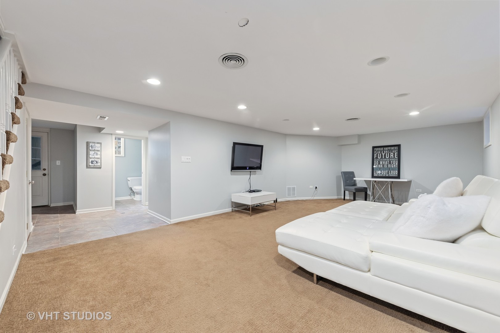 1108 Woodview Road Burr Ridge, IL 60527 - Photo 21 of 29 a spacious bedroom with a bed and a flat screen tv