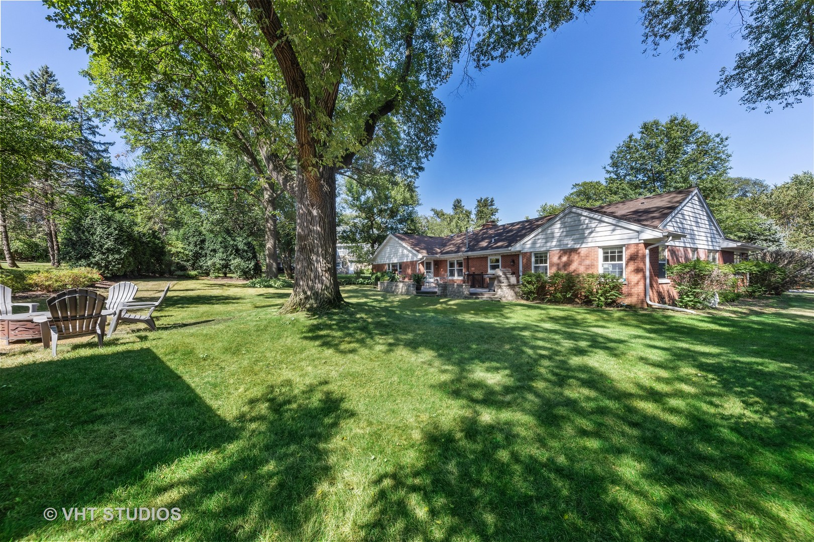 1108 Woodview Road Burr Ridge, IL 60527 - Photo 25 of 29 a view of a house with a big yard
