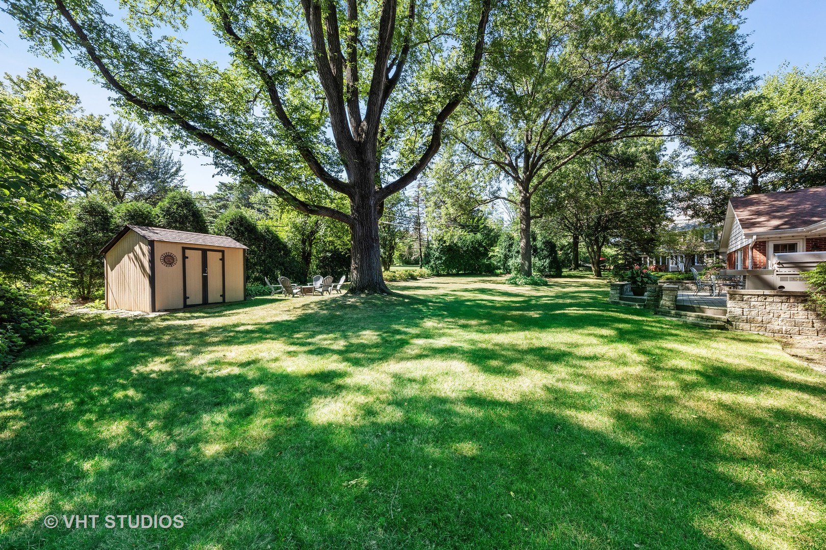 1108 Woodview Road Burr Ridge, IL 60527 - Photo 26 of 29 a garden view with a seating space