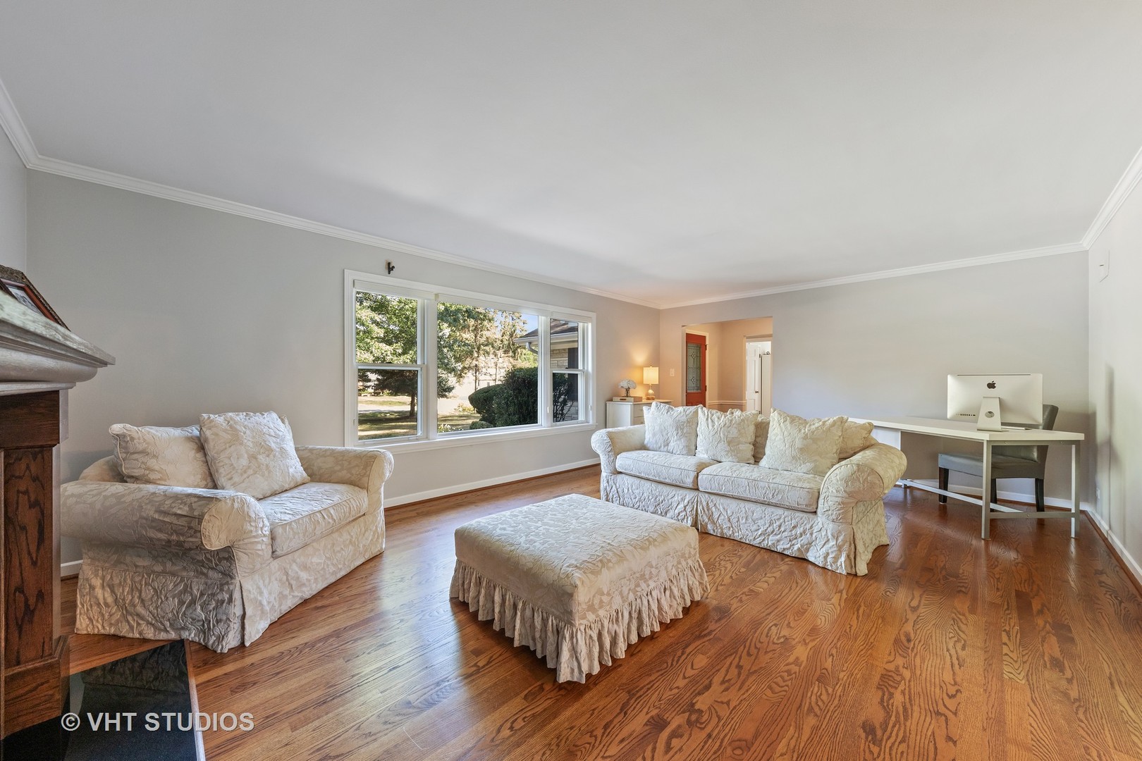 1108 Woodview Road Burr Ridge, IL 60527 - Photo 10 of 29 a living room with furniture and a wooden floor