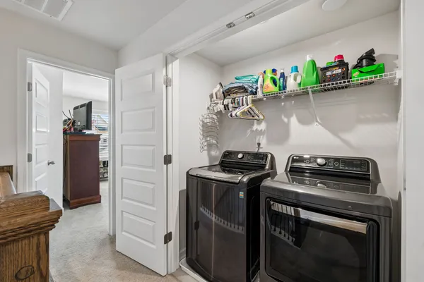 a view of a storage and utility room