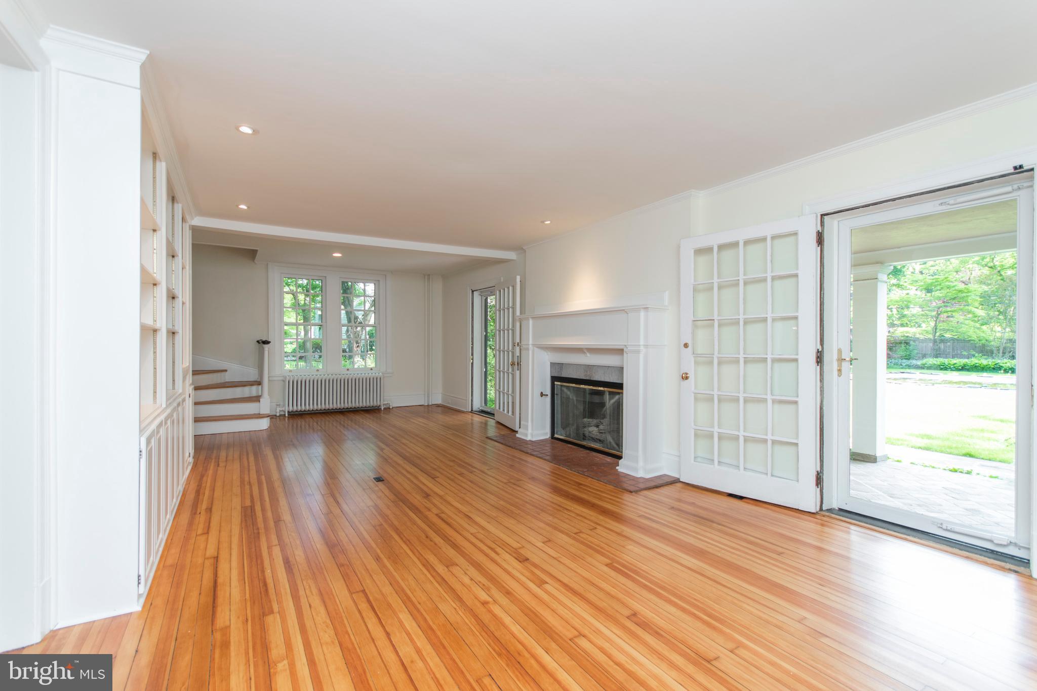 418 Dorset Road Devon, PA 19333 - Photo 12 of 54 Living Room with French Doors to Side Porch & Pool