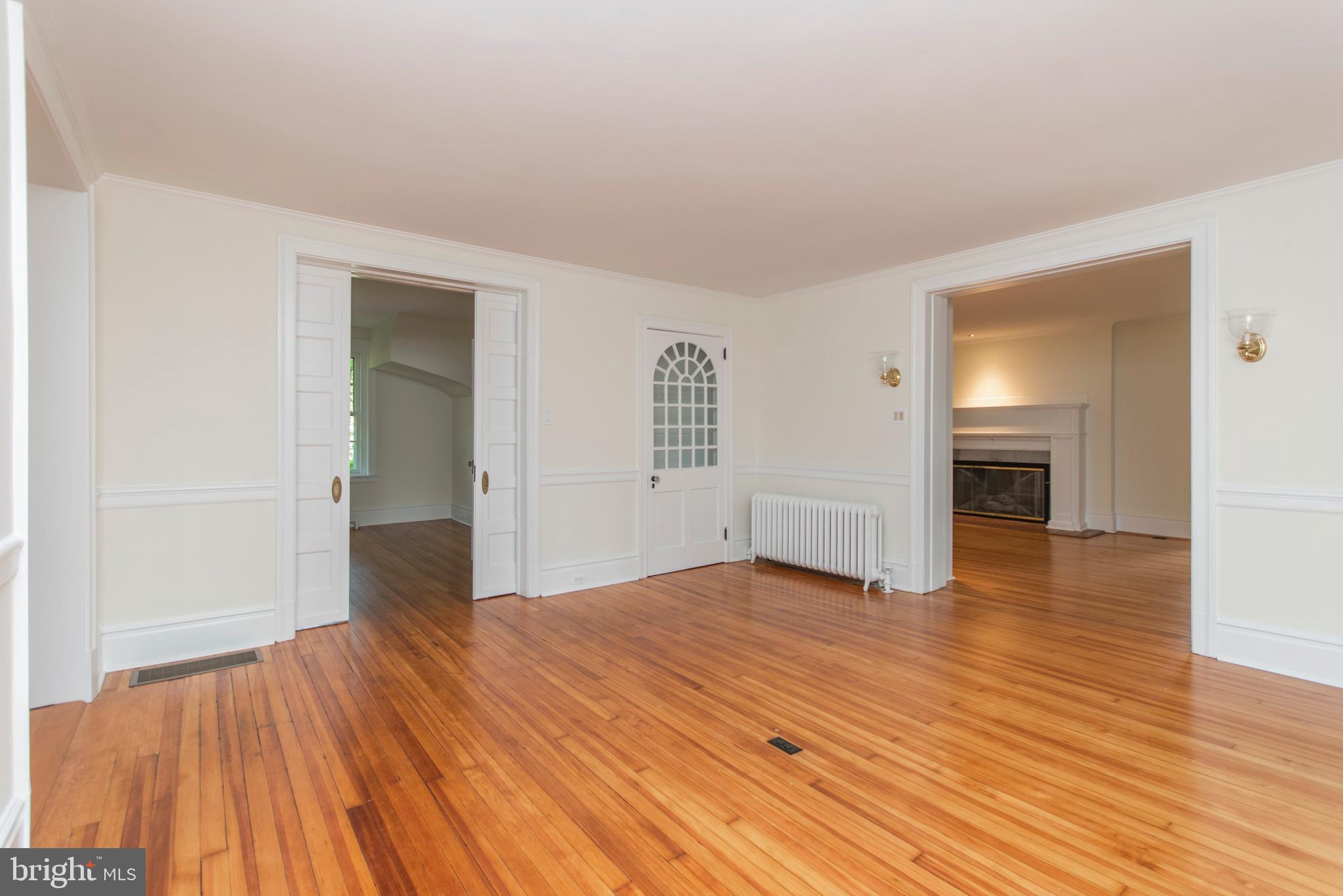 418 Dorset Road Devon, PA 19333 - Photo 17 of 54 Dining Room w/Pocket Doors, arched China Cabinet