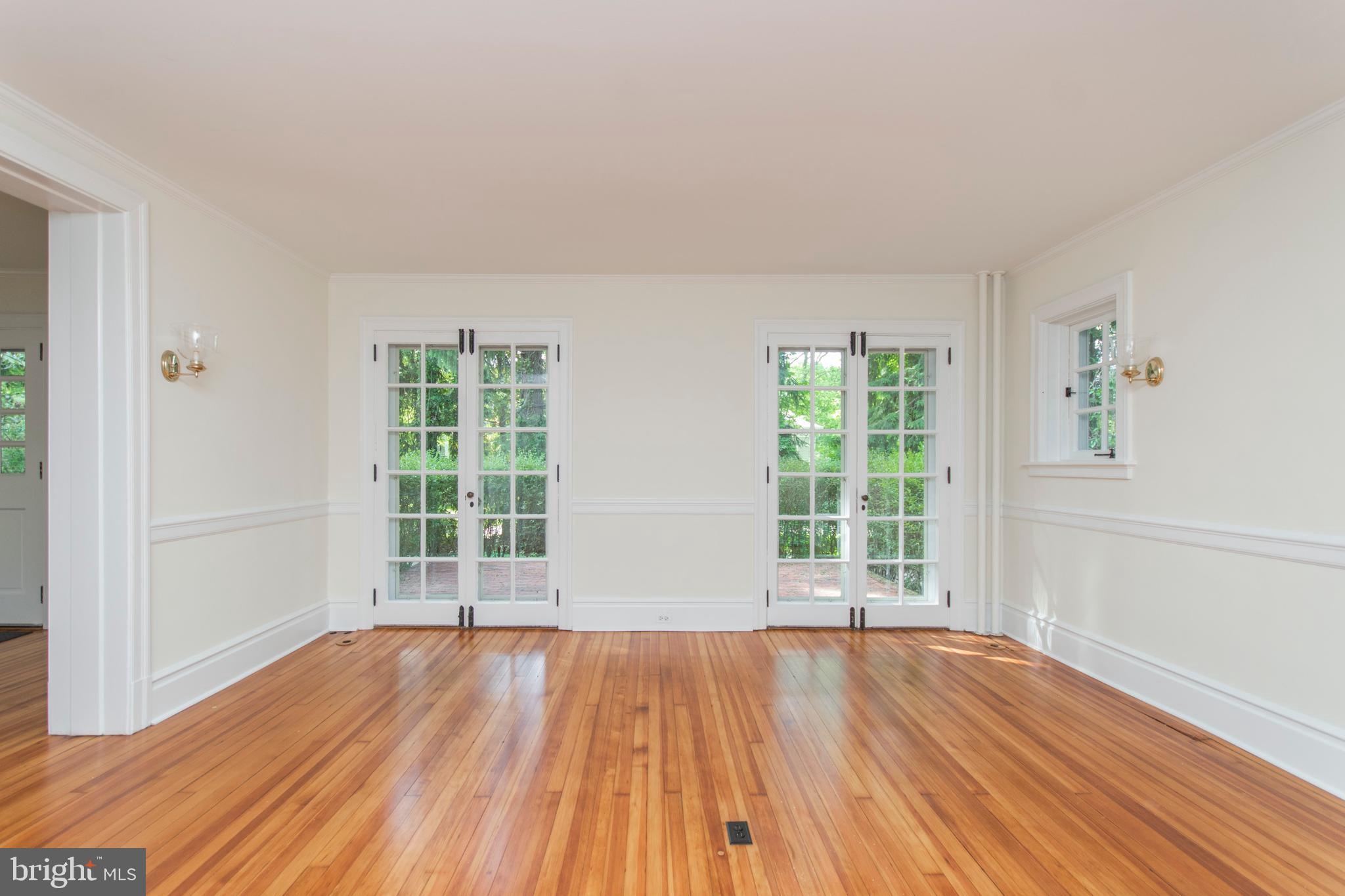 418 Dorset Road Devon, PA 19333 - Photo 18 of 54 French Doors from Dining Room to brick Patio