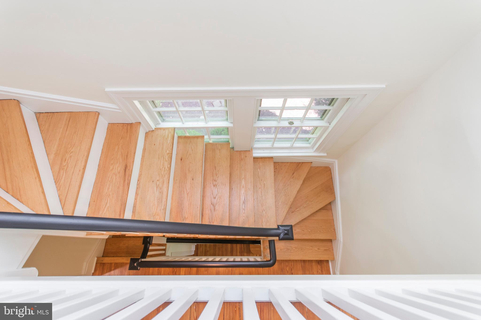418 Dorset Road Devon, PA 19333 - Photo 33 of 54 Turned Staircase flows to open 3rd floor landing