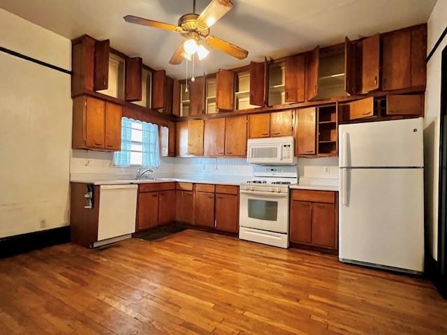378 9th Street Northeast, Unit 1 Atlanta, GA 30309 - Photo 5 of 9 a kitchen with stainless steel appliances granite countertop a refrigerator and a stove top oven