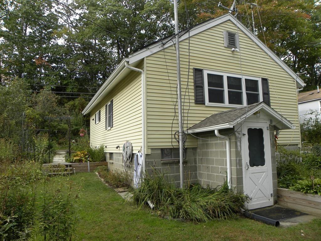 66 Osgood Road Charlton, MA 01507 - Photo 20 of 42 a view of a house with backyard
