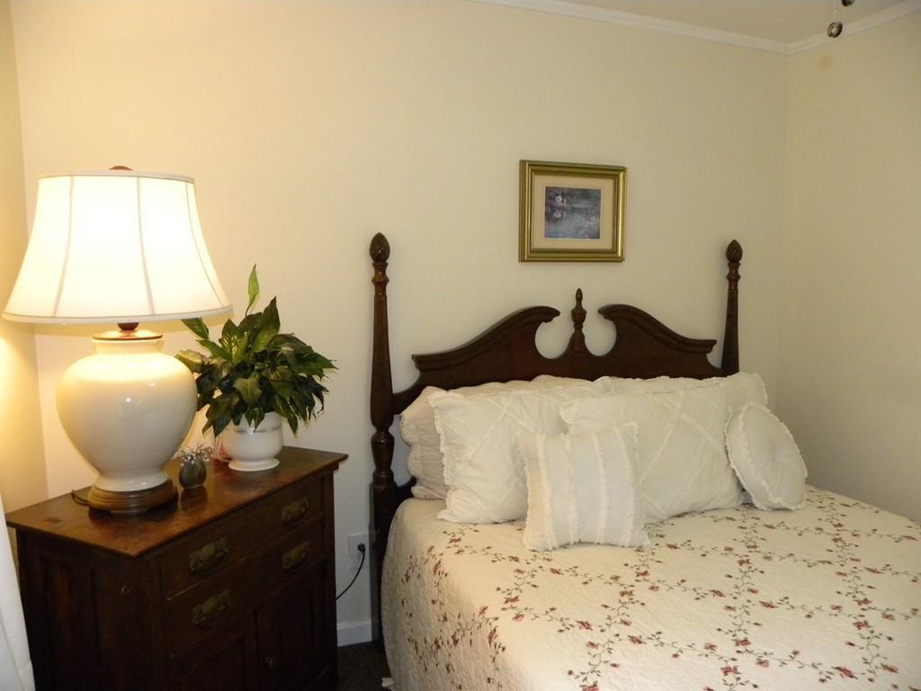 66 Osgood Road Charlton, MA 01507 - Photo 27 of 42 a bedroom with a bed and window
