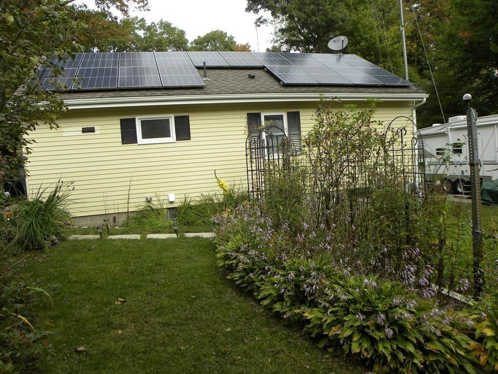 66 Osgood Road Charlton, MA 01507 - Photo 34 of 42 a front view of a house with a yard