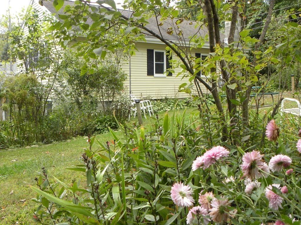 66 Osgood Road Charlton, MA 01507 - Photo 40 of 42 a flower plants in front of a house