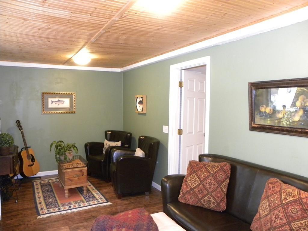 66 Osgood Road Charlton, MA 01507 - Photo 7 of 42 a living room with furniture