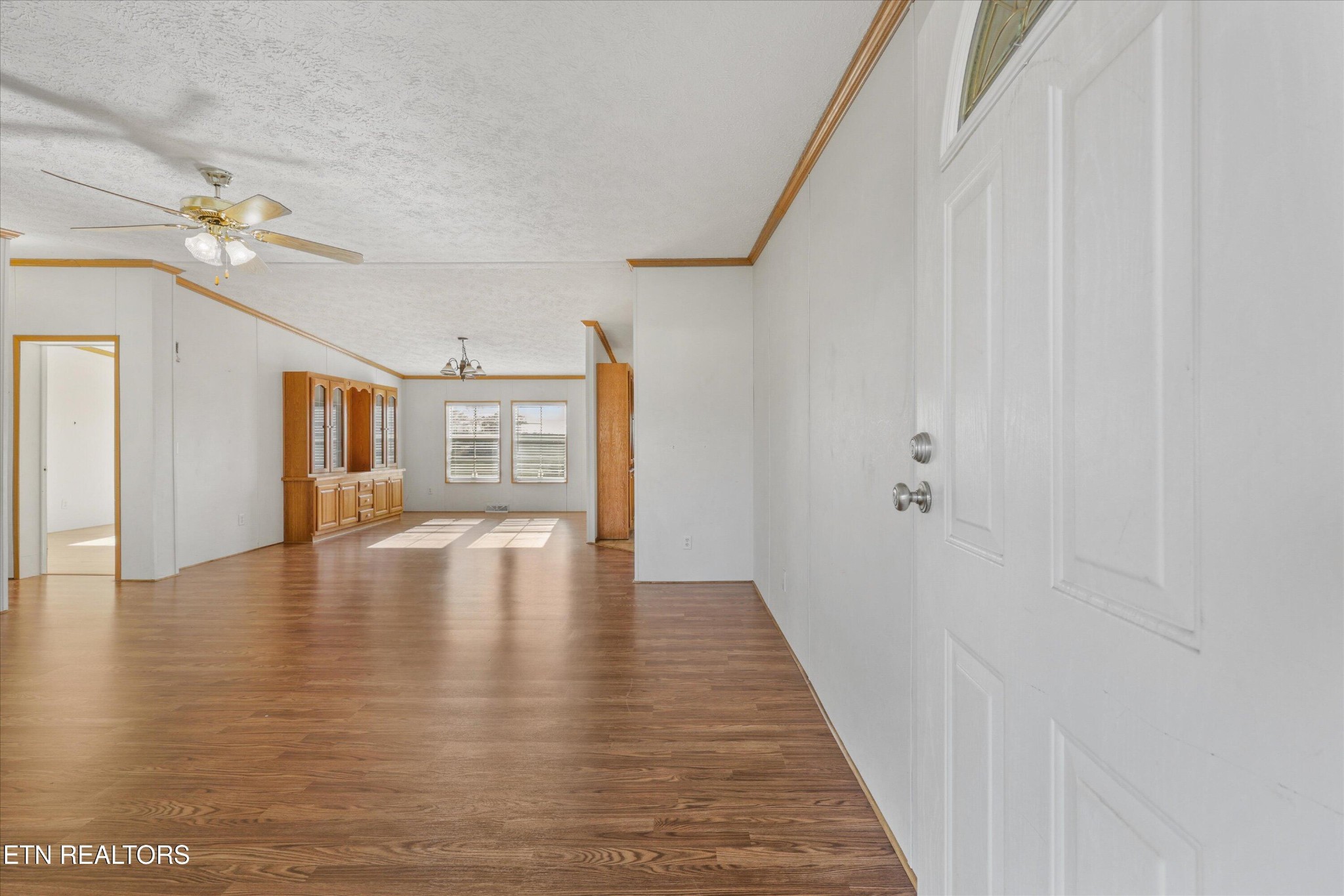 1130 Williamson Chapel Road Maryville, TN 37801 - Photo 11 of 36 a view of an empty room with wooden floor and a window