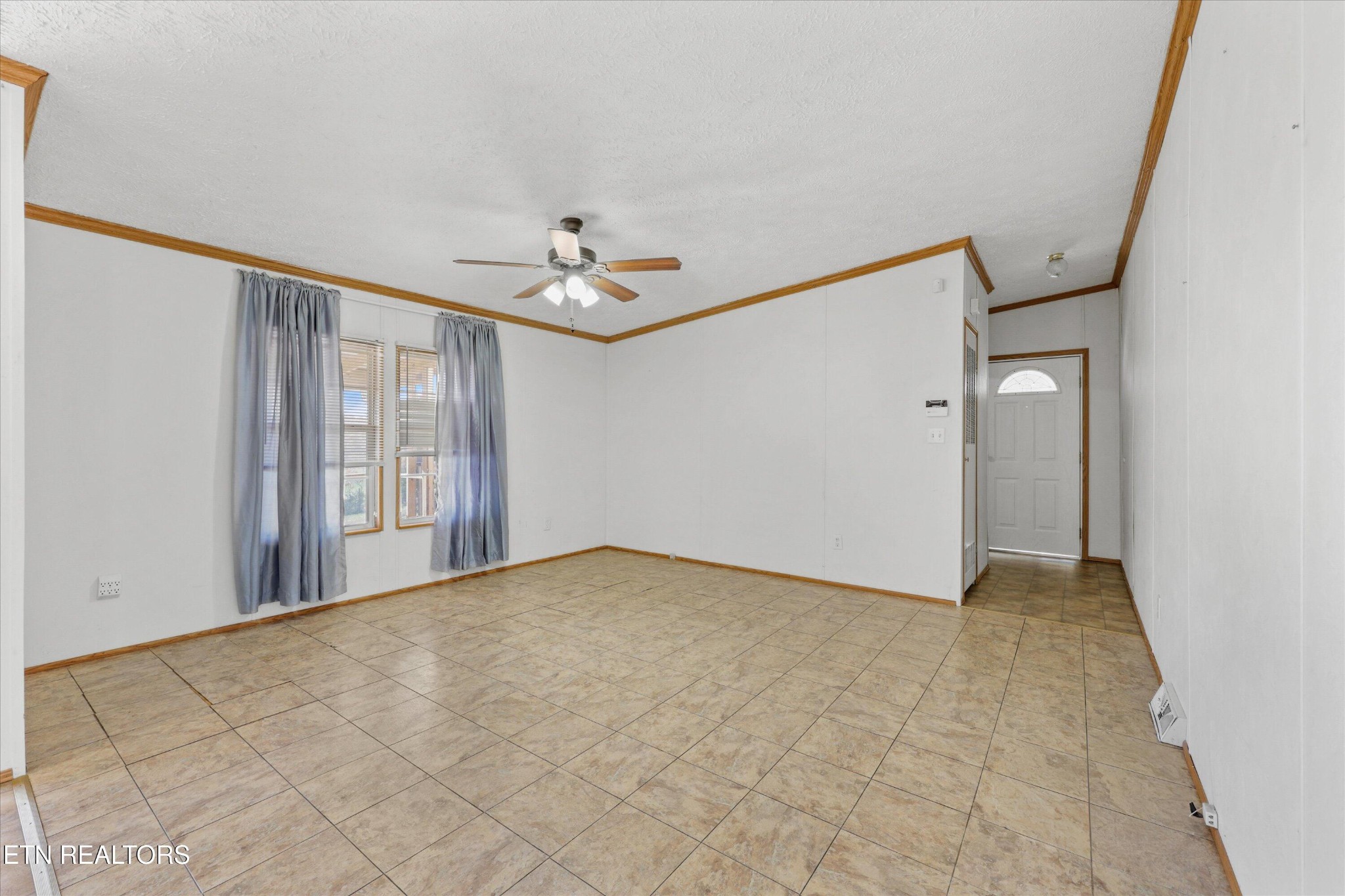 1130 Williamson Chapel Road Maryville, TN 37801 - Photo 13 of 36 a view of an empty room with chandelier fan