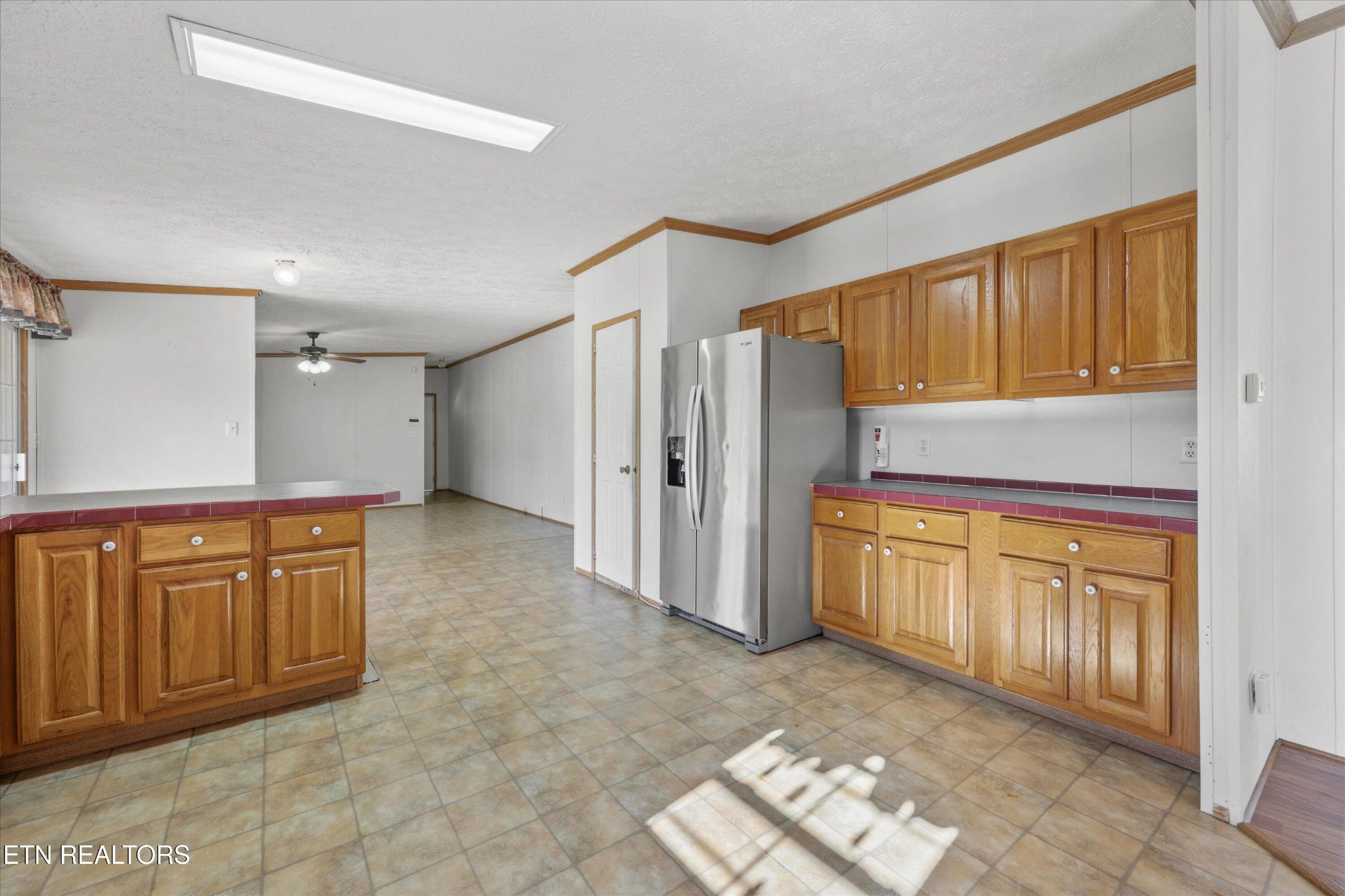1130 Williamson Chapel Road Maryville, TN 37801 - Photo 15 of 36 a spacious bathroom with a granite countertop sink and a mirror