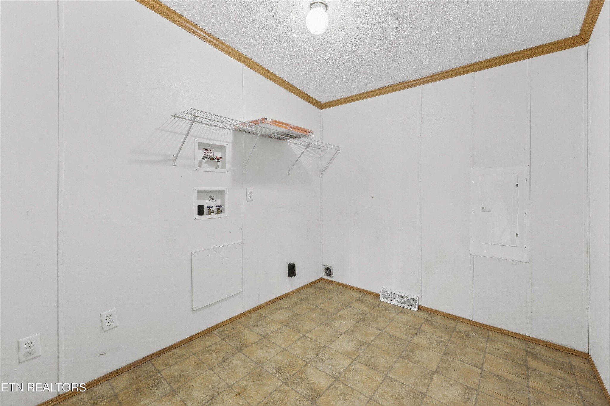 1130 Williamson Chapel Road Maryville, TN 37801 - Photo 23 of 36 a view of a room with racks on the wall
