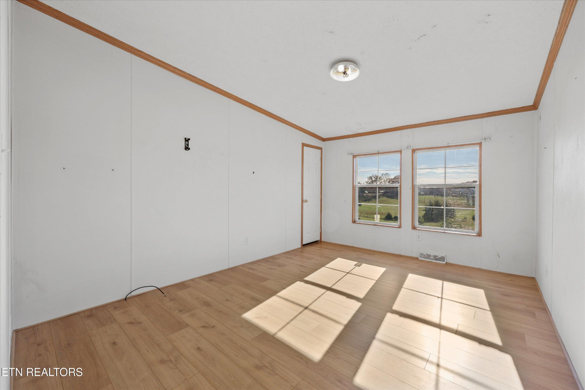 1130 Williamson Chapel Road Maryville, TN 37801 - Photo 24 of 36 a view of an empty room with a window