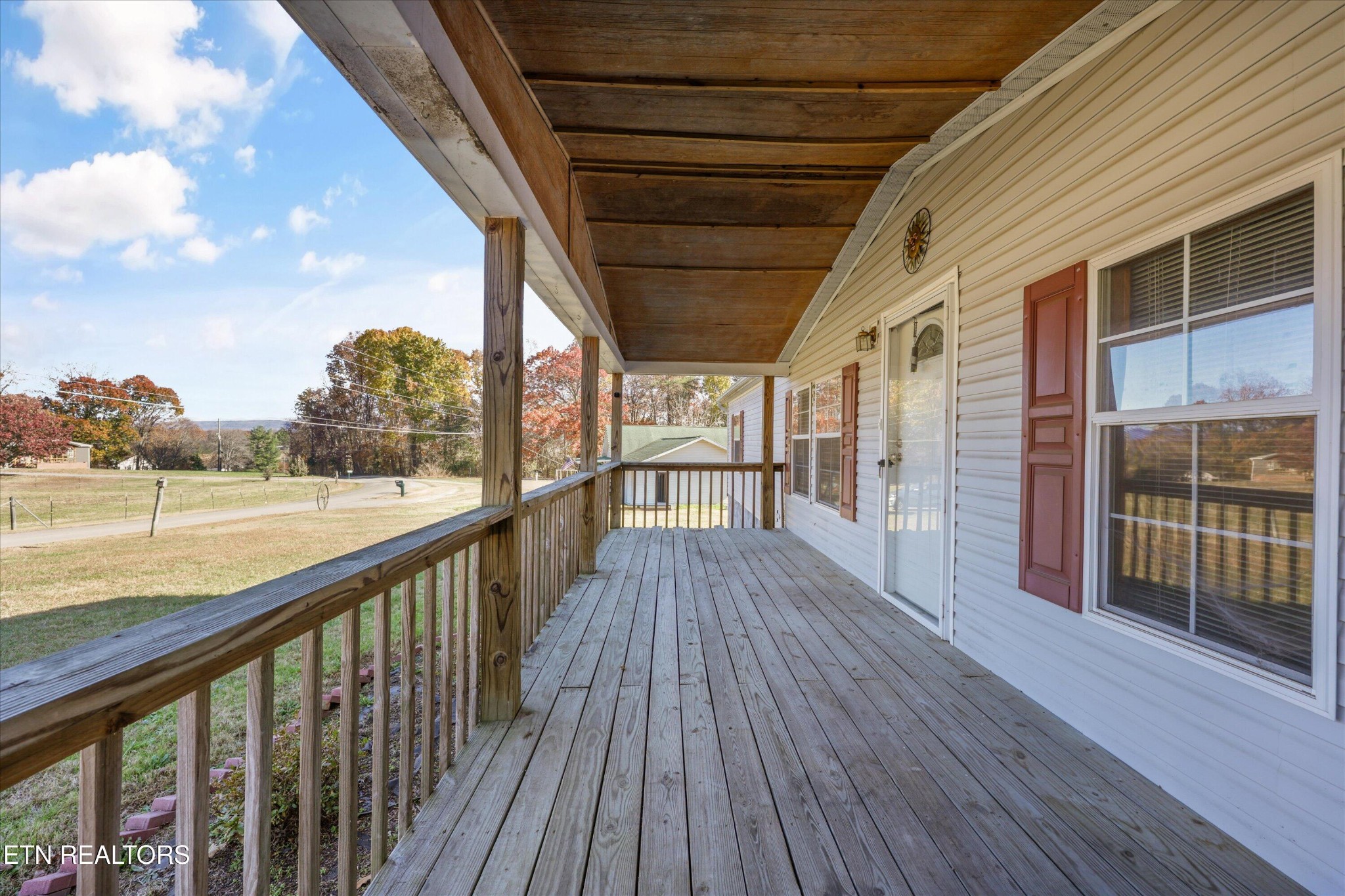 1130 Williamson Chapel Road Maryville, TN 37801 - Photo 7 of 36 a view of a balcony with wooden floor