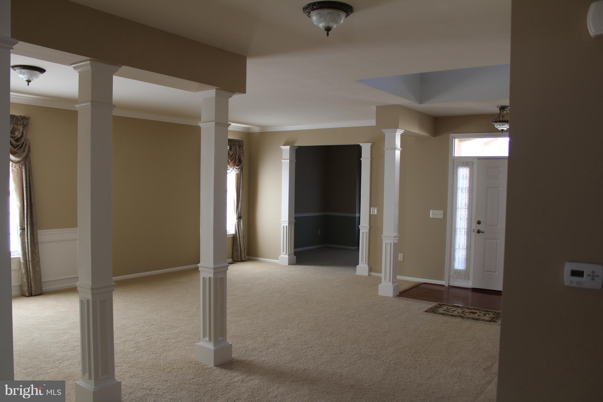 106 Hummingbird Way Sewell, NJ 08080 - Photo 8 of 11 Open Living Room into Dining & Library