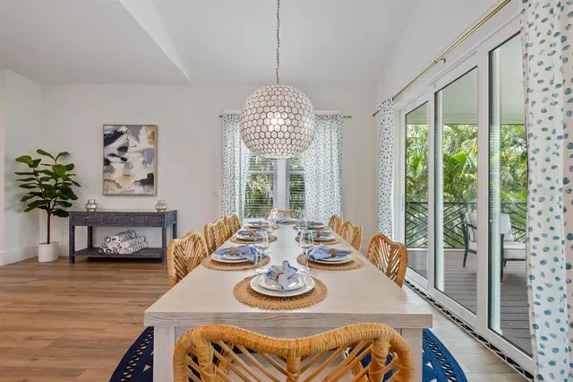 a bedroom with a bed and a table