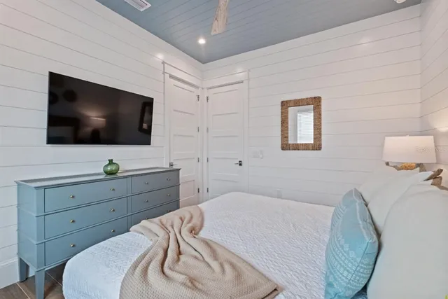 a bathroom with a toilet a sink and a mirror