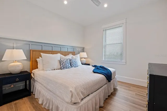 a view of an outdoor dining space with a table and chairs