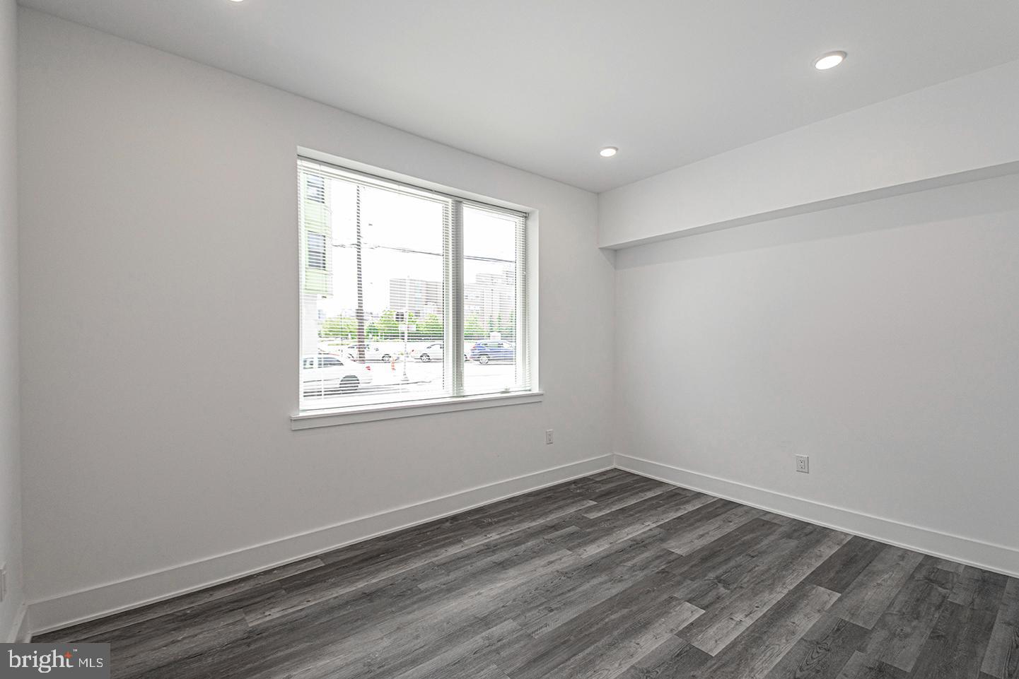 1245 Ridge Avenue, Unit 103 Philadelphia, PA 19123 - Photo 14 of 18 an empty room with a window