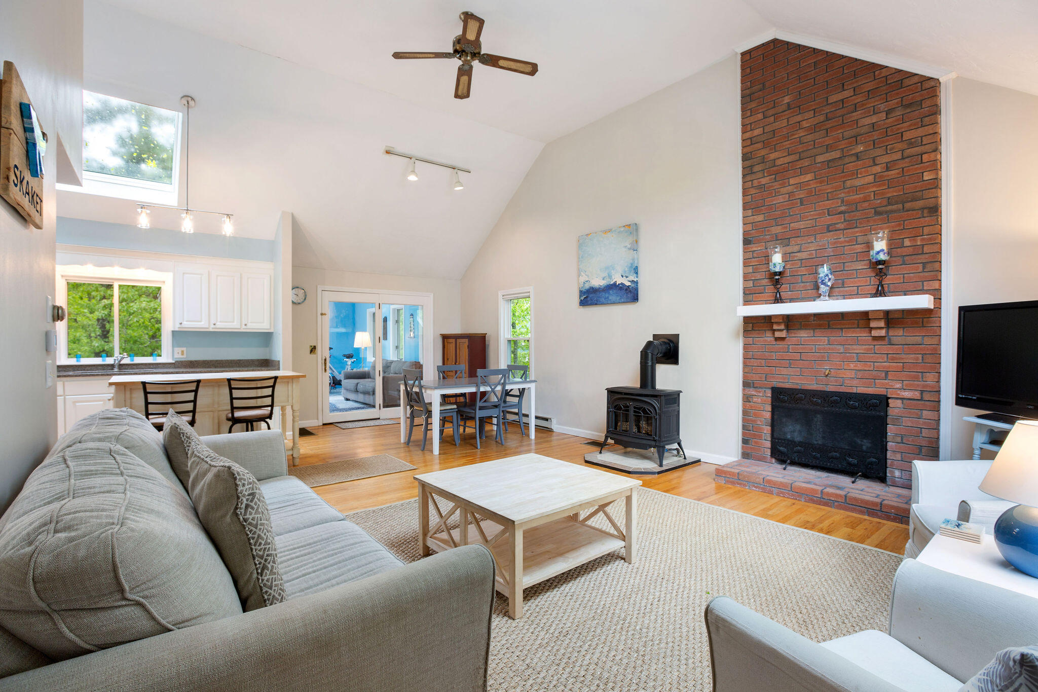 94 Pine View Drive Brewster, MA 02631 - Photo 11 of 51 a living room with furniture and a fireplace
