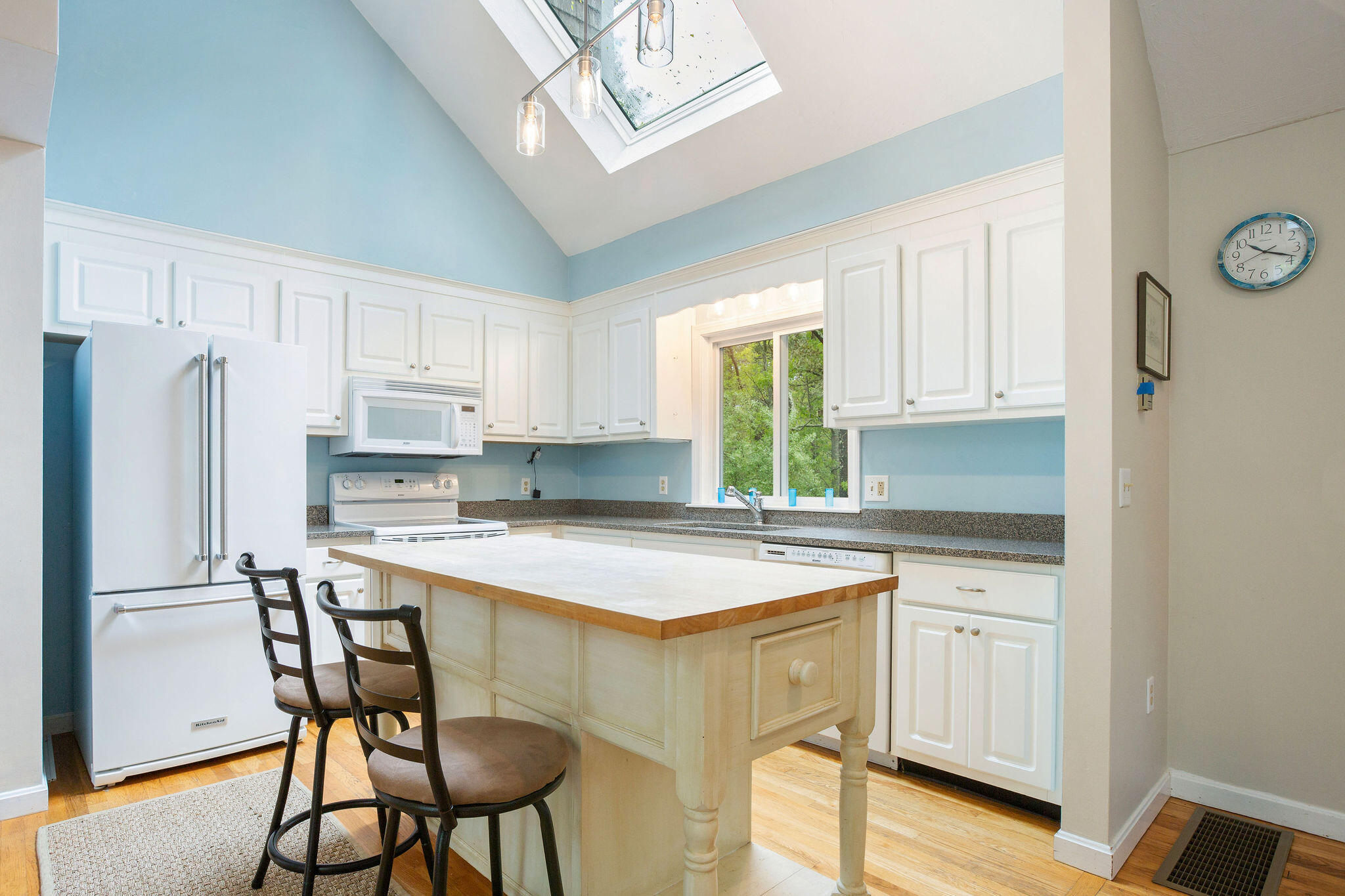 94 Pine View Drive Brewster, MA 02631 - Photo 20 of 51 a kitchen with stainless steel appliances white cabinets and a refrigerator