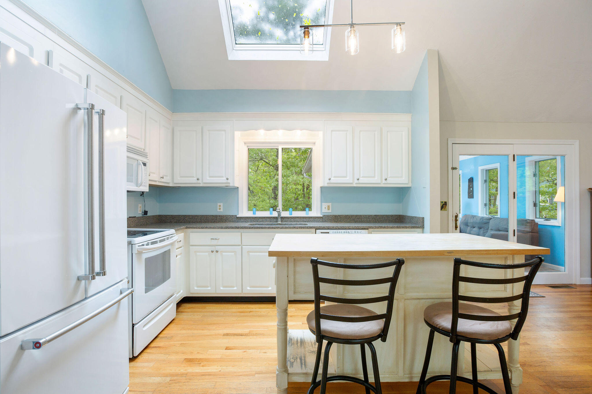 94 Pine View Drive Brewster, MA 02631 - Photo 21 of 51 a kitchen with stainless steel appliances a stove a sink refrigerator and cabinets