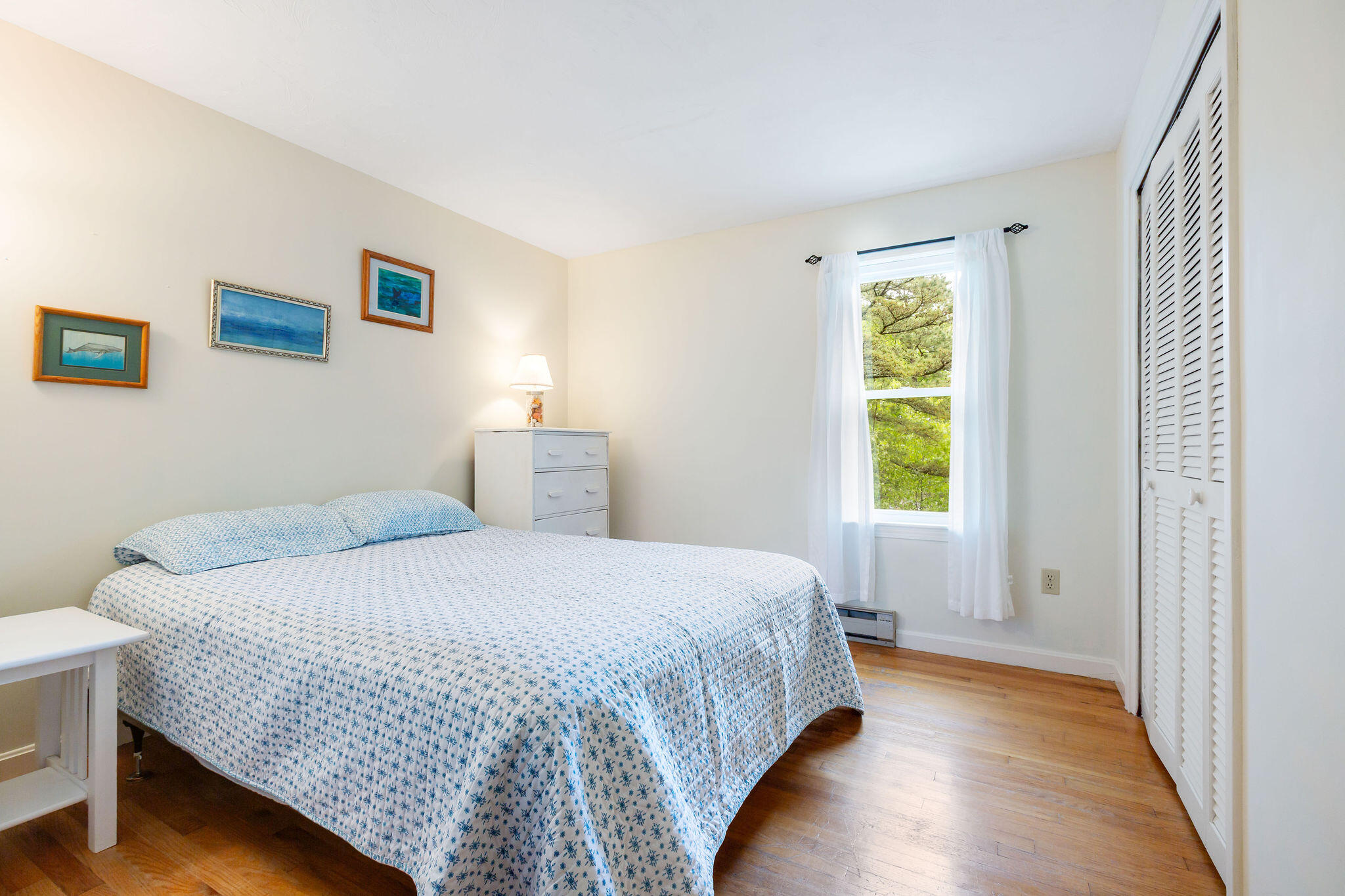 94 Pine View Drive Brewster, MA 02631 - Photo 25 of 51 a bedroom with a bed and a window