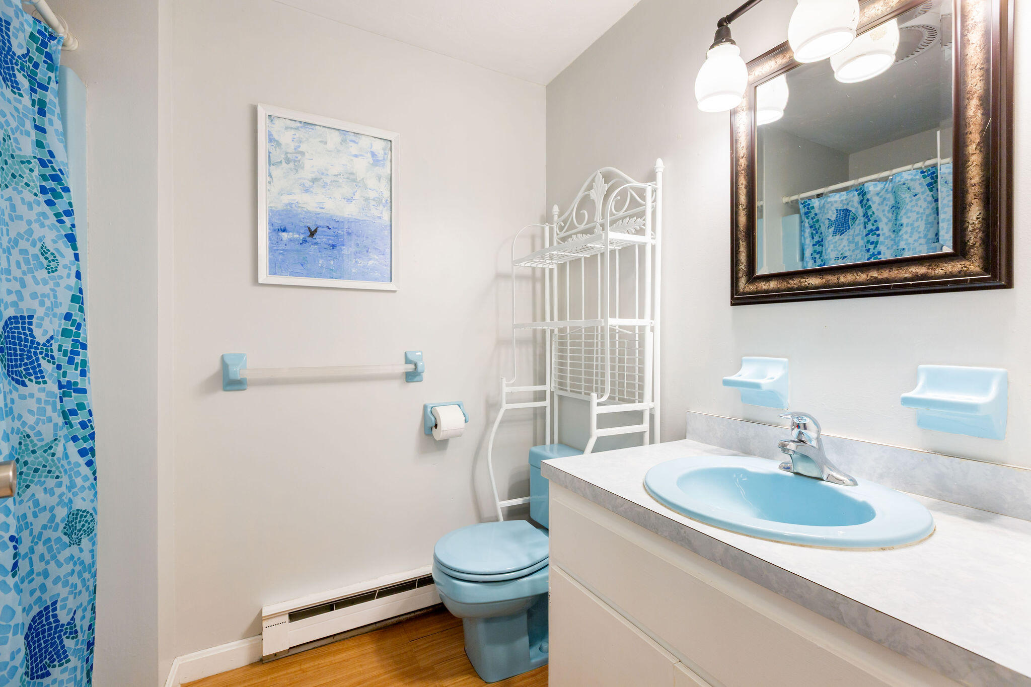 94 Pine View Drive Brewster, MA 02631 - Photo 27 of 51 a bathroom with a sink a toilet and a mirror