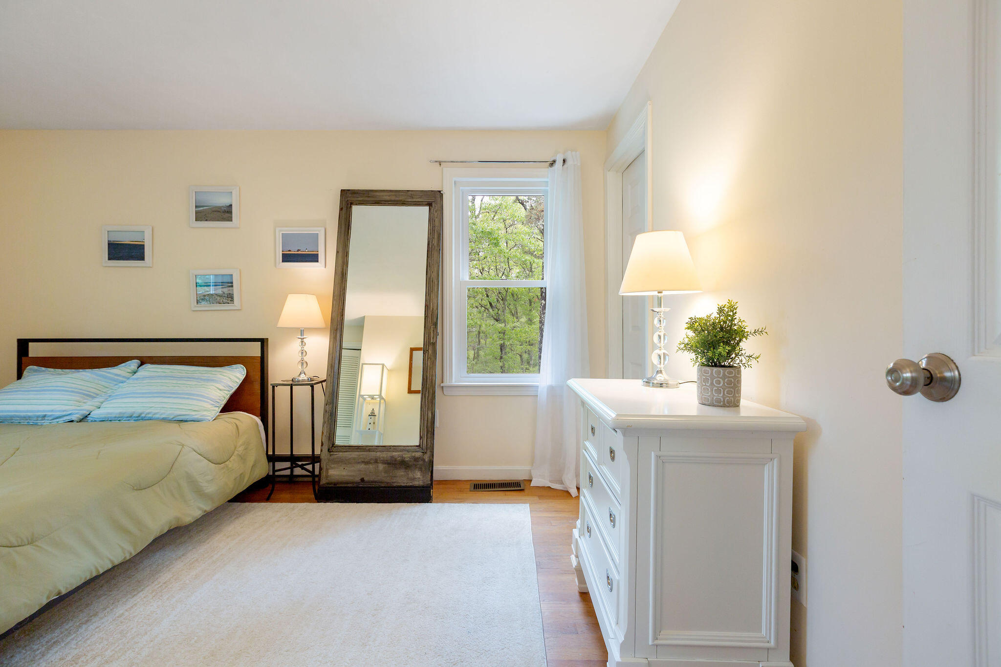 94 Pine View Drive Brewster, MA 02631 - Photo 30 of 51 a bedroom with a bed and a window