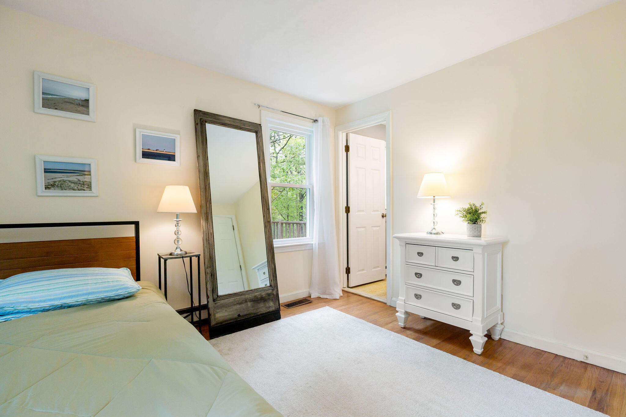 94 Pine View Drive Brewster, MA 02631 - Photo 33 of 51 a bedroom with a bed and a dresser