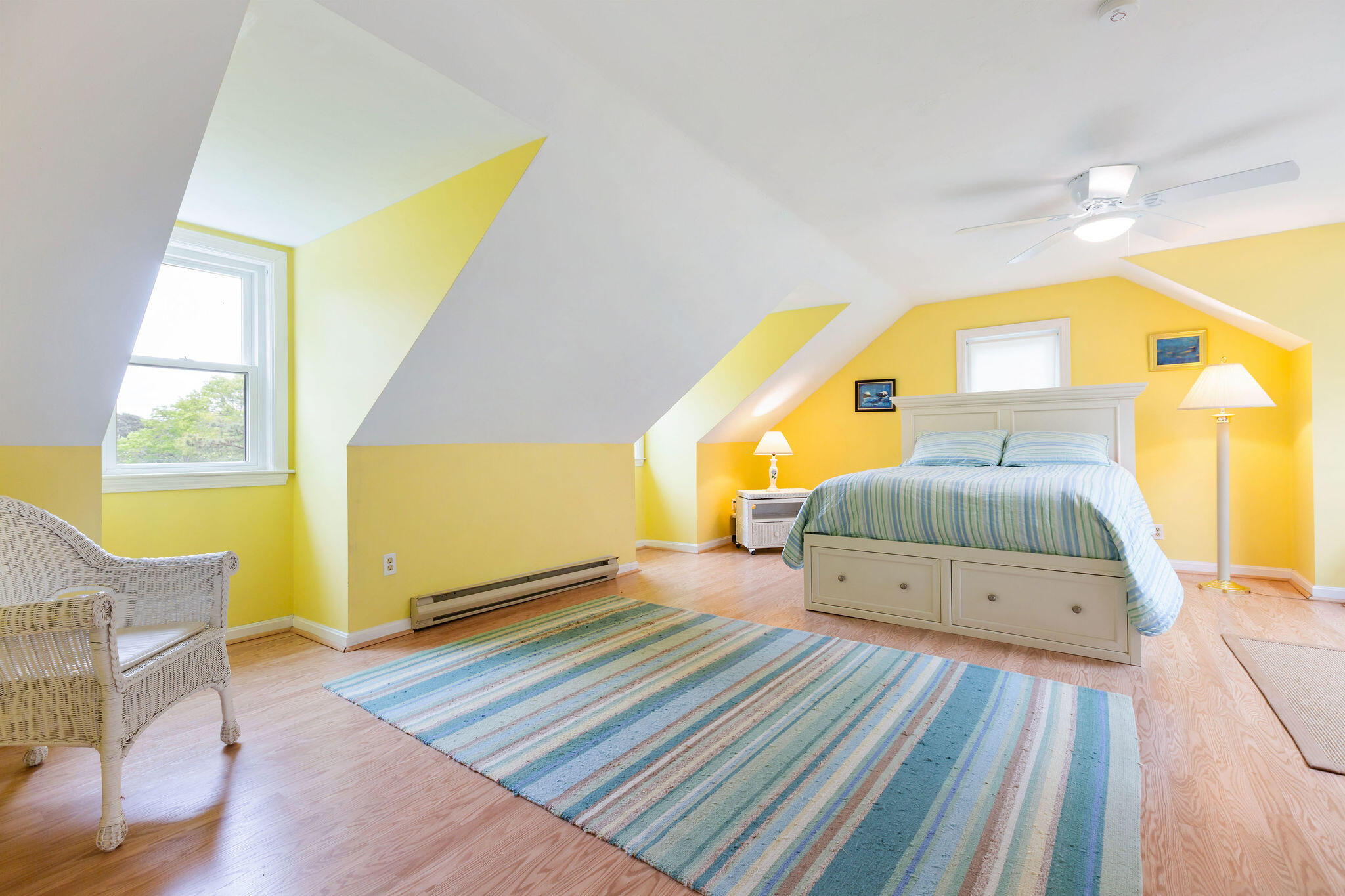 94 Pine View Drive Brewster, MA 02631 - Photo 35 of 51 a bedroom with a bed and wooden floor