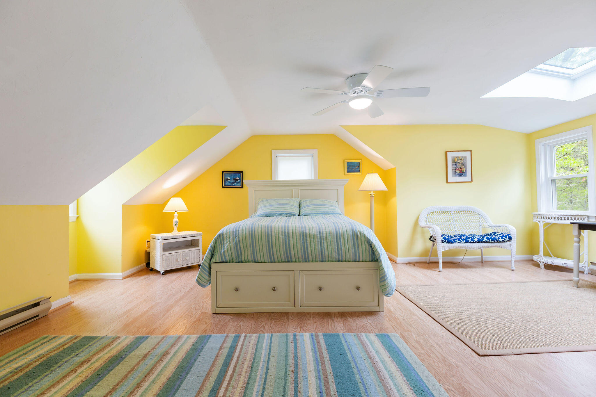 94 Pine View Drive Brewster, MA 02631 - Photo 36 of 51 a bedroom with a bed and wooden floor