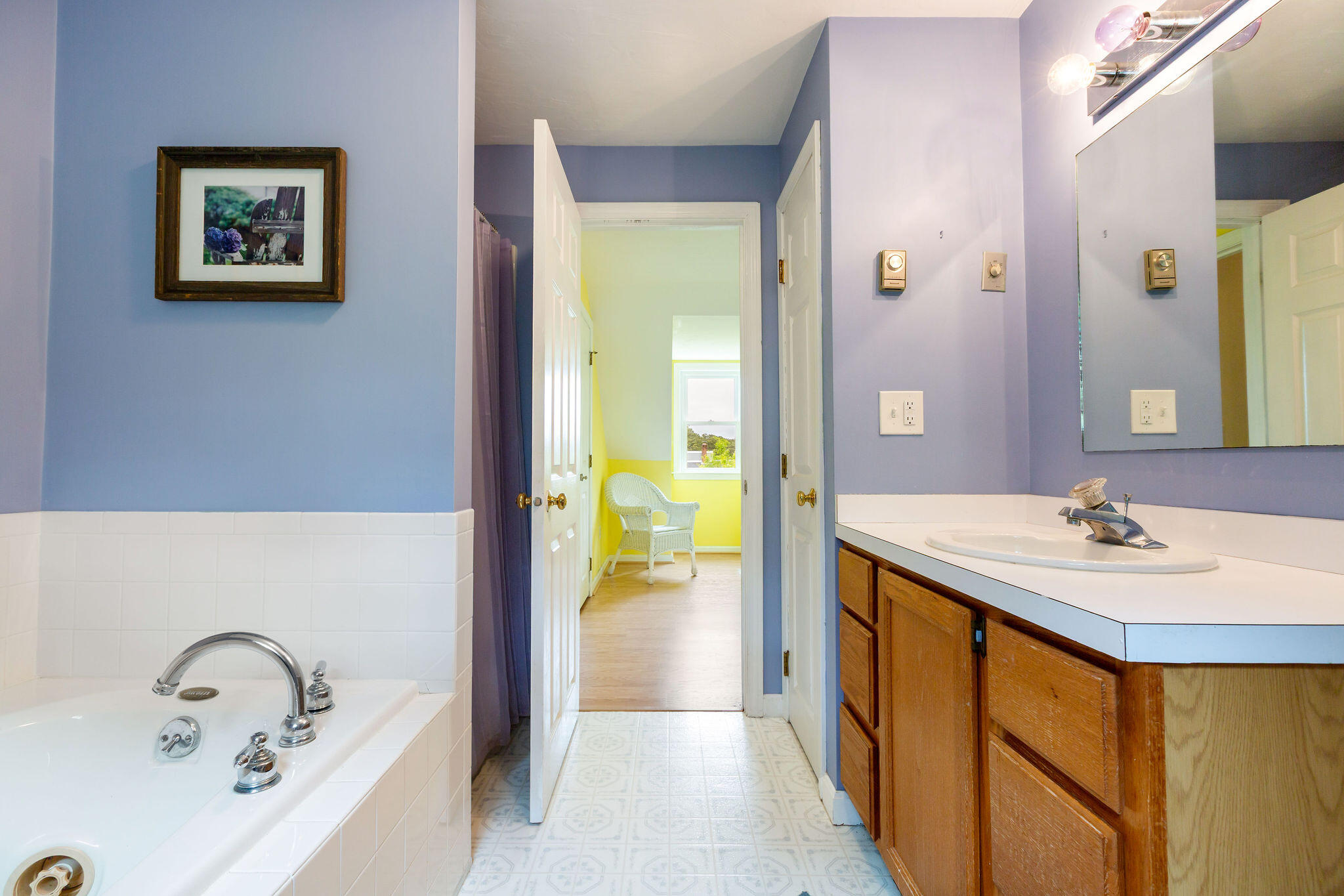 94 Pine View Drive Brewster, MA 02631 - Photo 41 of 51 a en suite bathroom with a sink and a mirror