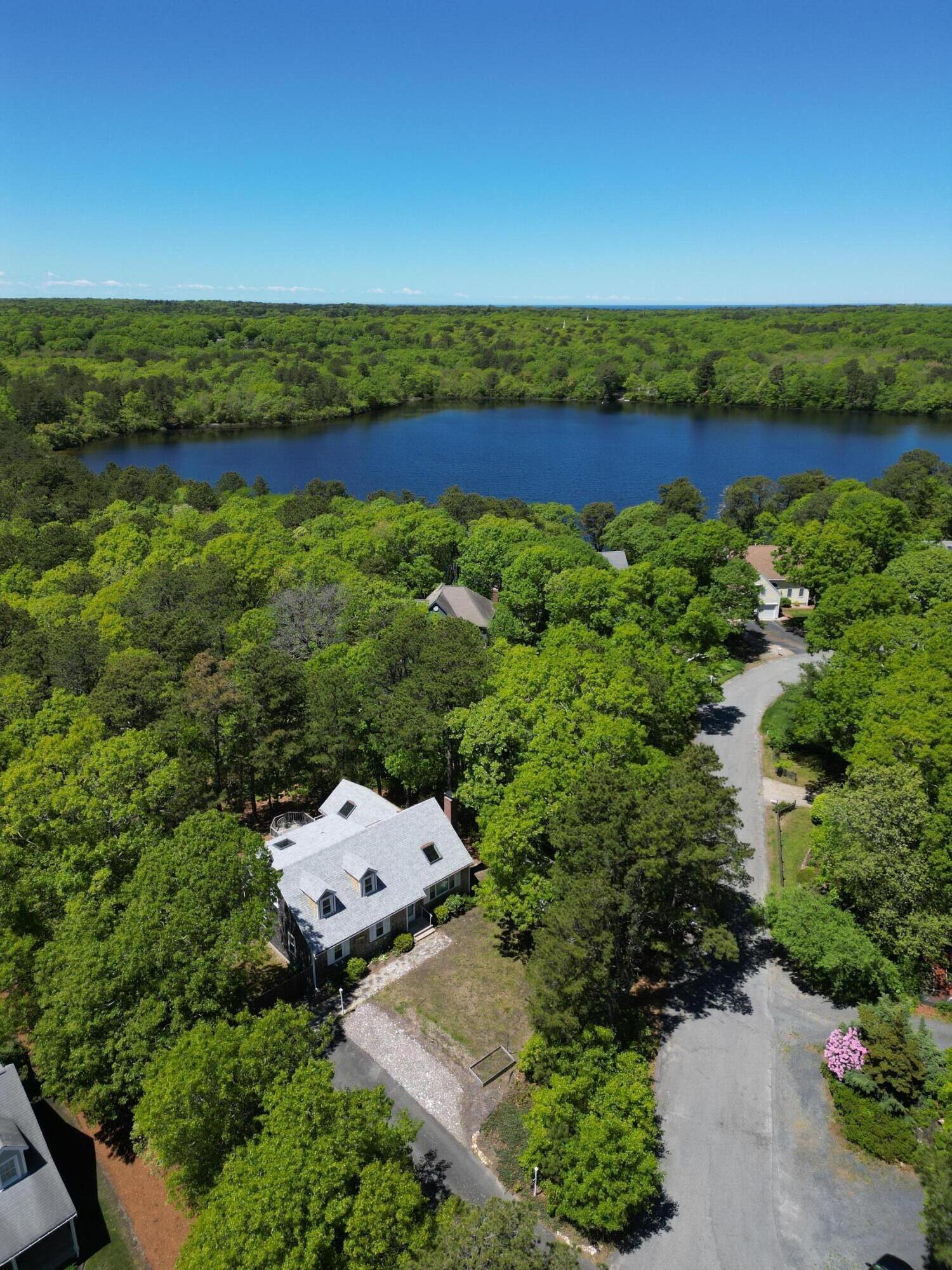 94 Pine View Drive Brewster, MA 02631 - Photo 43 of 51 an aerial view of a house with lake view