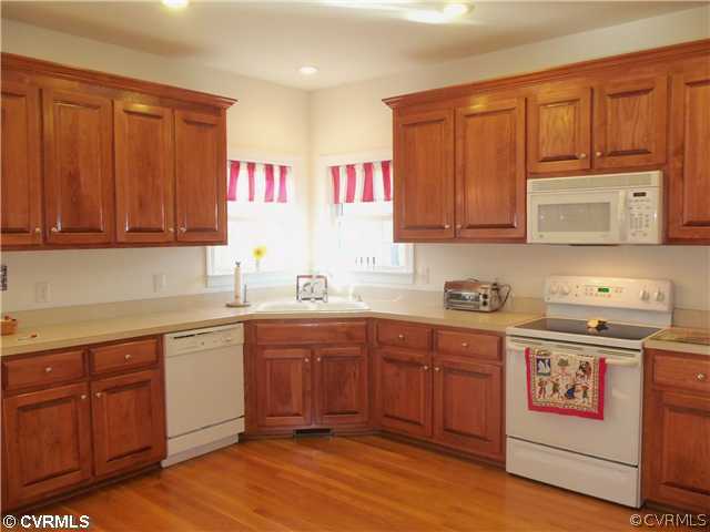 1380 Quarter Mill Court Powhatan, VA 23139 - Photo 6 of 12 Kitchen - Plenty of cabinets with hardwood floors