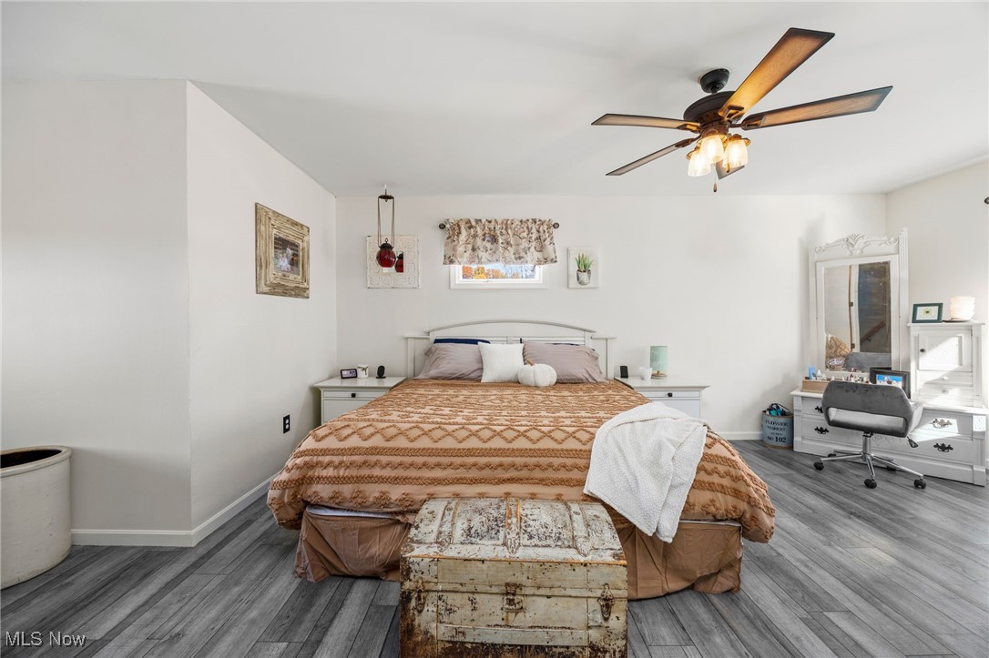 11827 Stratton Road West Salem, OH 44287 - Photo 31 of 47 Bedroom featuring wood finished floors and a ceiling fan