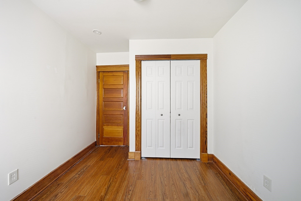 31 Whitcomb Street Webster, MA 01570 - Photo 12 of 39 a view of hallway with wooden floor