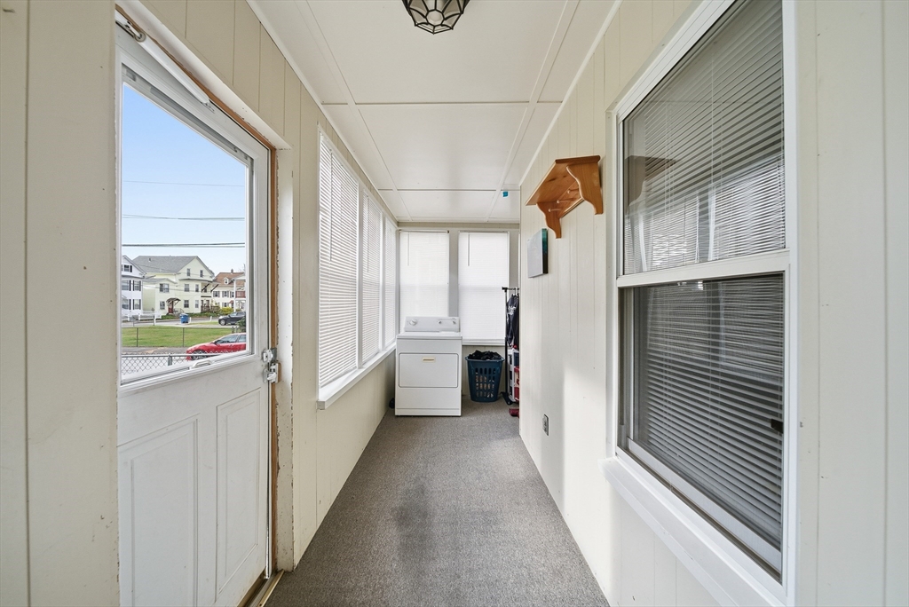 31 Whitcomb Street Webster, MA 01570 - Photo 14 of 39 a view of a hallway with window