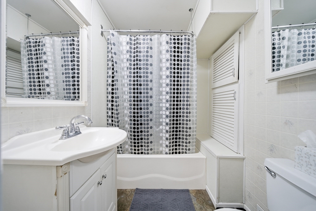 31 Whitcomb Street Webster, MA 01570 - Photo 25 of 39 a bathroom with a sink and a mirror