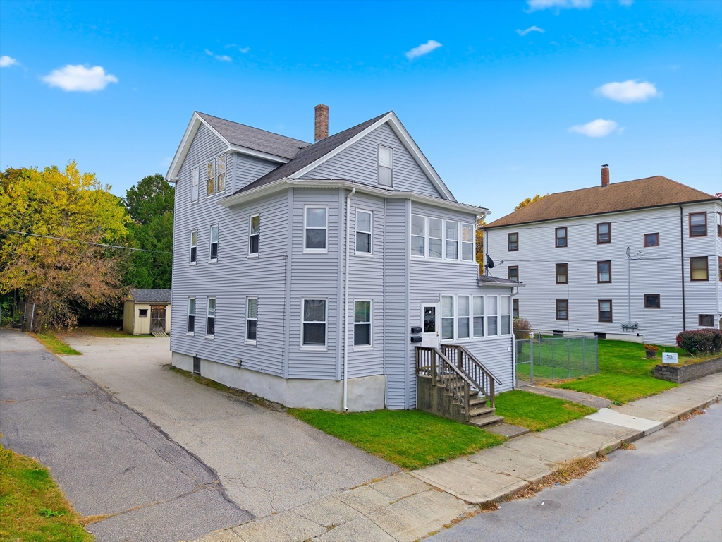 31 Whitcomb Street Webster, MA 01570 - Photo 31 of 39 a view of a house with a yard