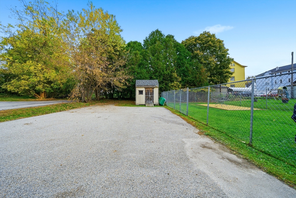 31 Whitcomb Street Webster, MA 01570 - Photo 33 of 39 a view of a house with backyard and a tree