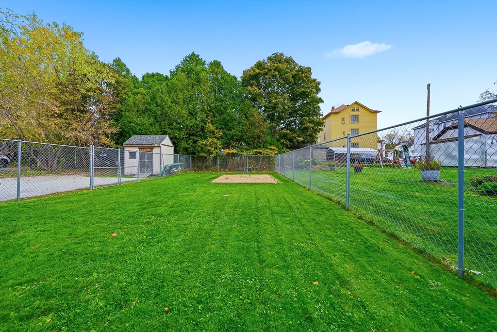 31 Whitcomb Street Webster, MA 01570 - Photo 35 of 39 a view of a house with a yard and sitting area
