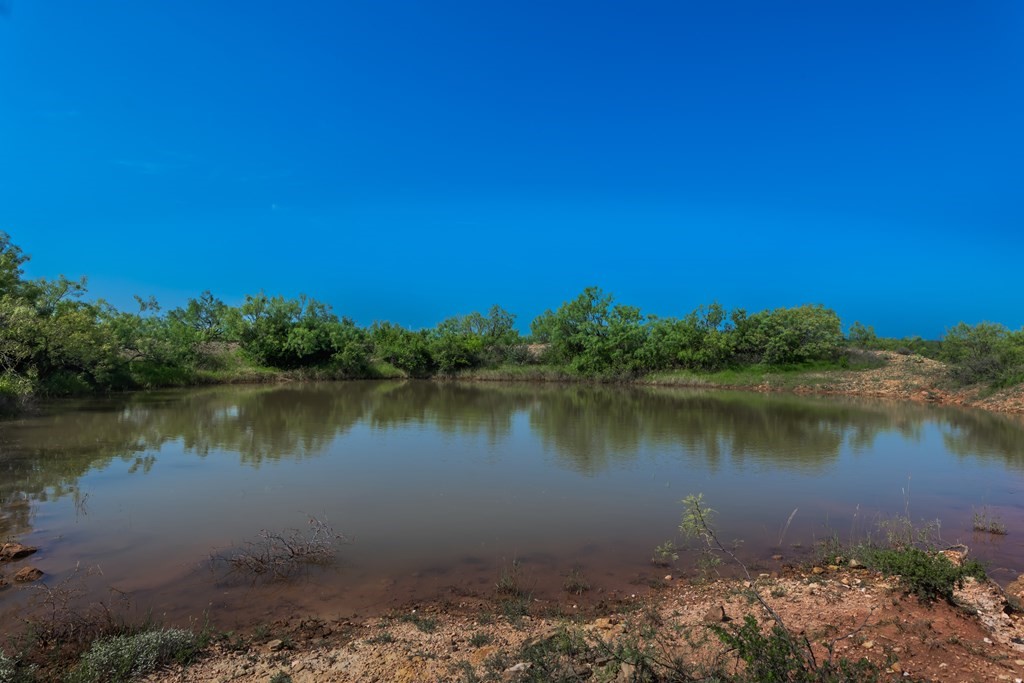88291 Suaa Rd Well Lohn, TX 76852 - Photo 22 of 44 a view of a lake with a city