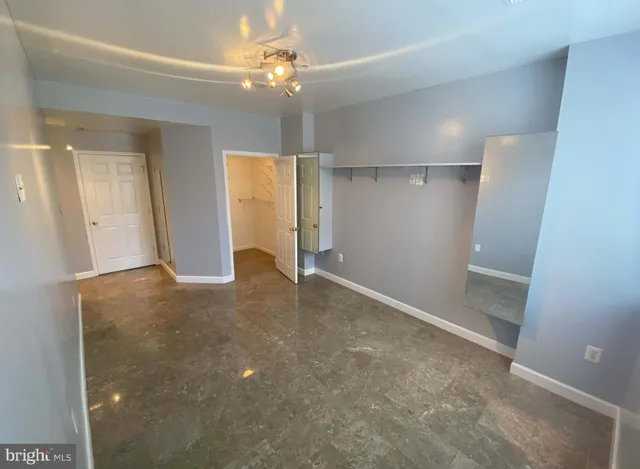 a bathroom with a bathtub a toilet and a shower