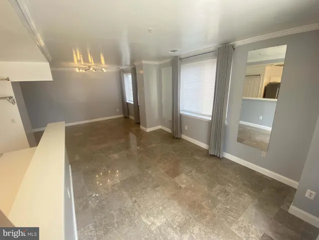 a kitchen with a stove microwave and refrigerator