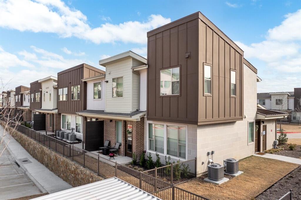 a front view of a house with garage