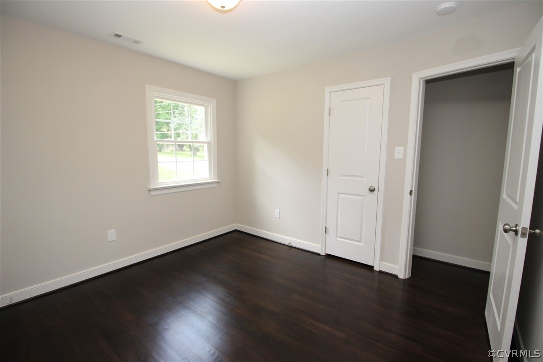 923 Schroeder Road Powhatan, VA 23139 - Photo 17 of 32 Front end BR w/ 2 windows & refinished hardwoods